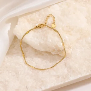 Dunne motief armband goud