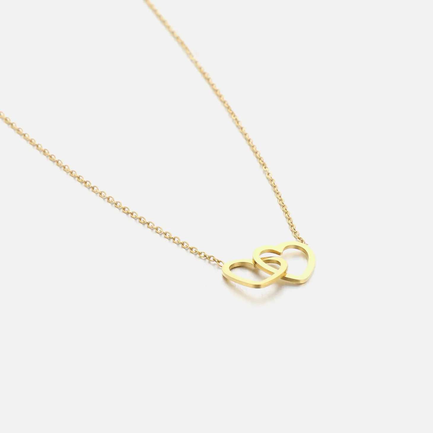 ketting_verbonden_hart_go_0.webp Ketting verbonden hart goud