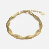 Platte gedraaide armband goud