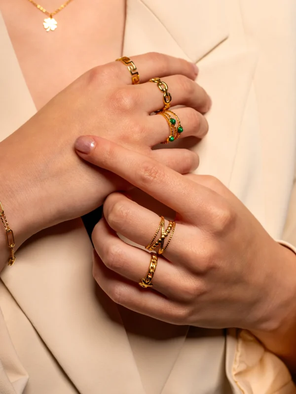 Ring three gems green goud