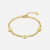 Schakelarmband smiley faces goud