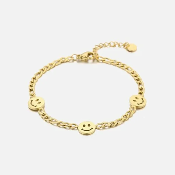 Schakelarmband smiley faces goud